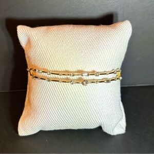 MACY’s adjustable women’s accent bracelet in a gold tone.